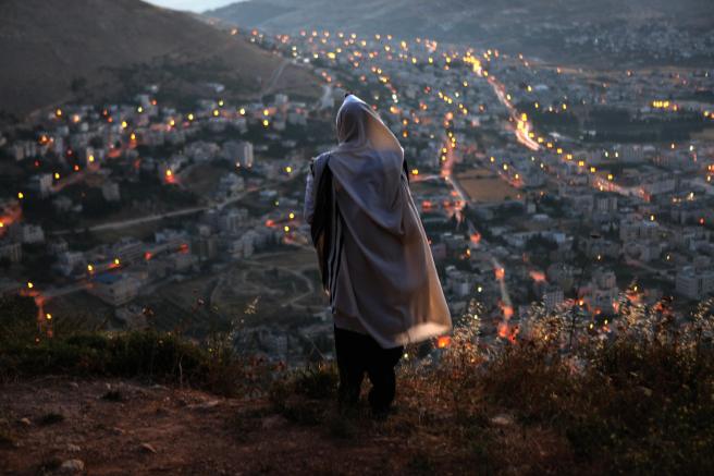 An ultra-Orthodox Jew prays on Mount Ger